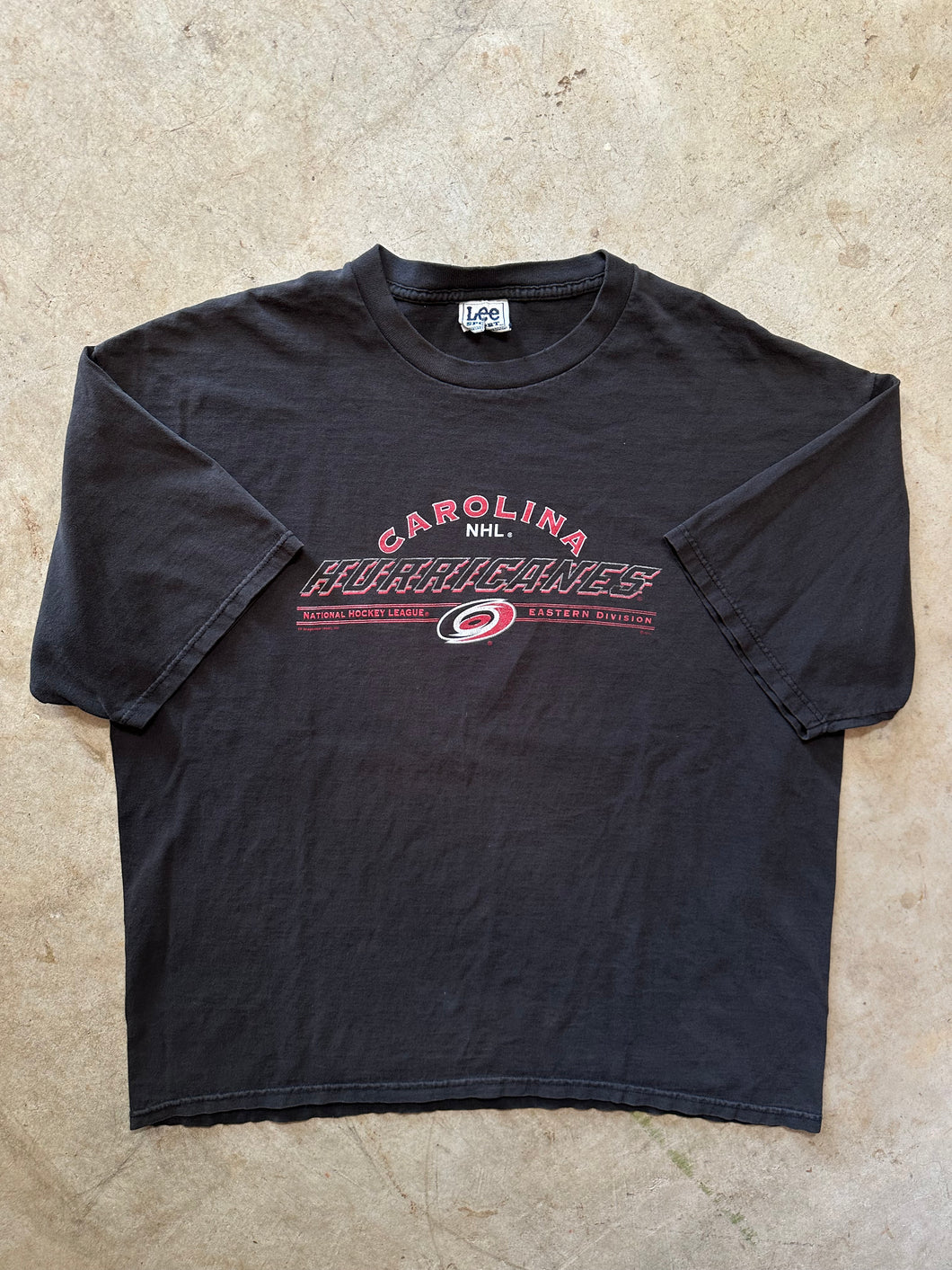 Vintage Carolina Hurricanes NHL Spell Out Black 1990's T-Shirt (XL)