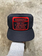 Load image into Gallery viewer, Vintage Warning This Vet is Medicated Trucker Snapback Hat
