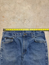 Load image into Gallery viewer, Vintage Carhartt Darkstone Denim Jeans Relaxed Fit Pants (36x30)
